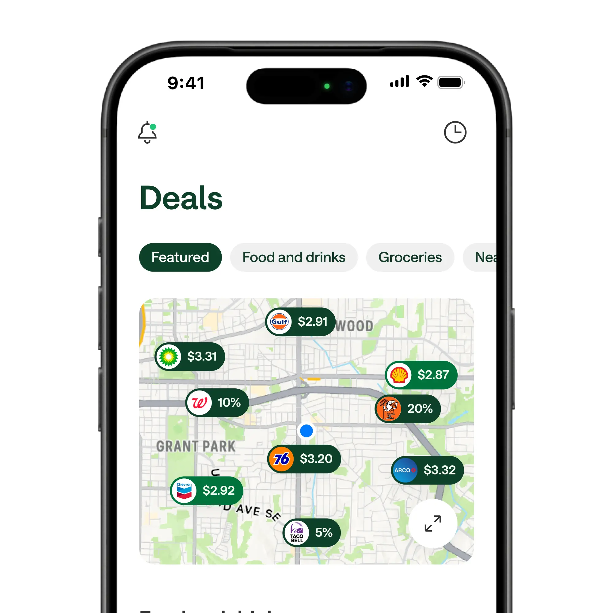 Smartphone displaying a deals app with a map showing nearby gas prices and discounts from brands like Shell, BP, and Taco Bell.