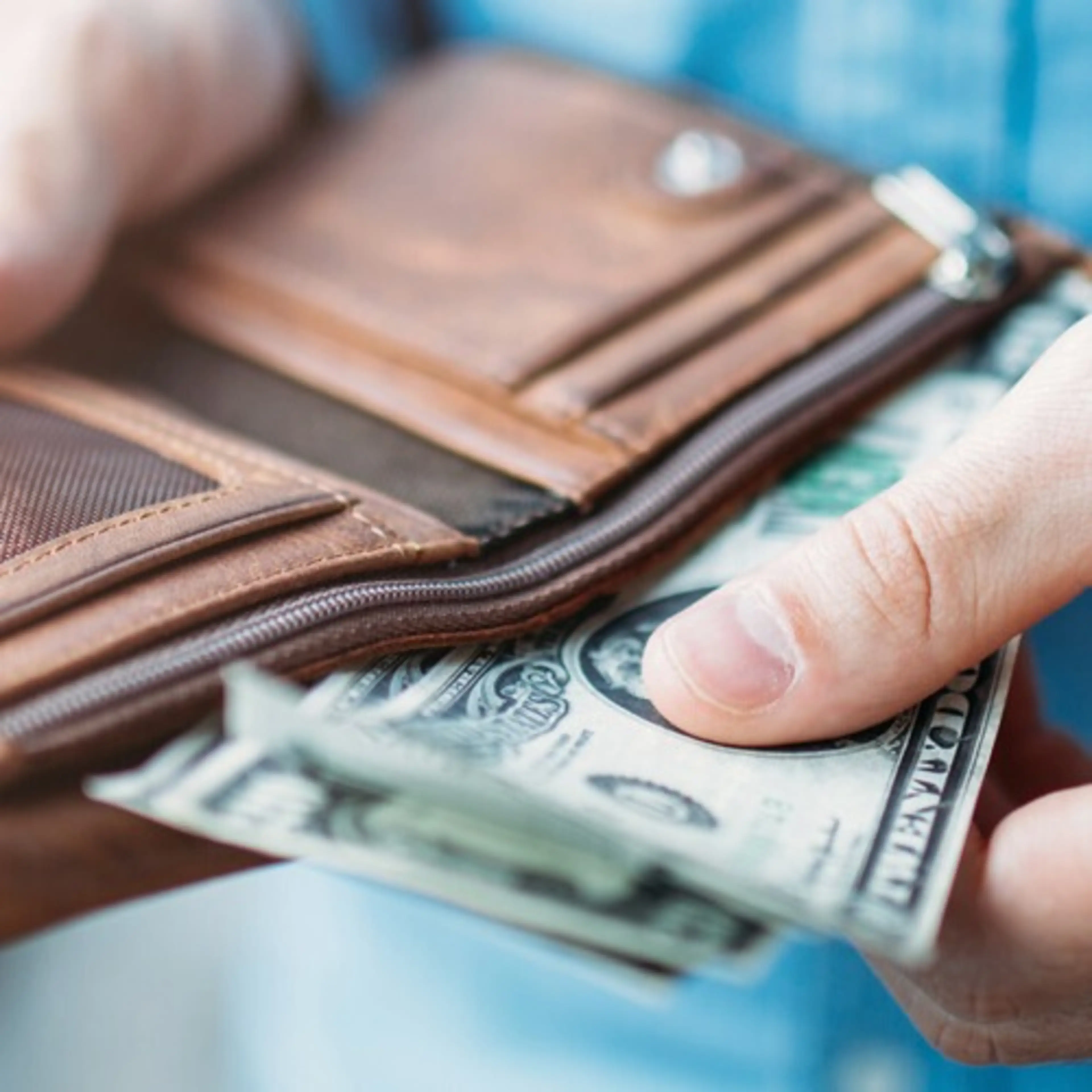 Taking cash out of wallet