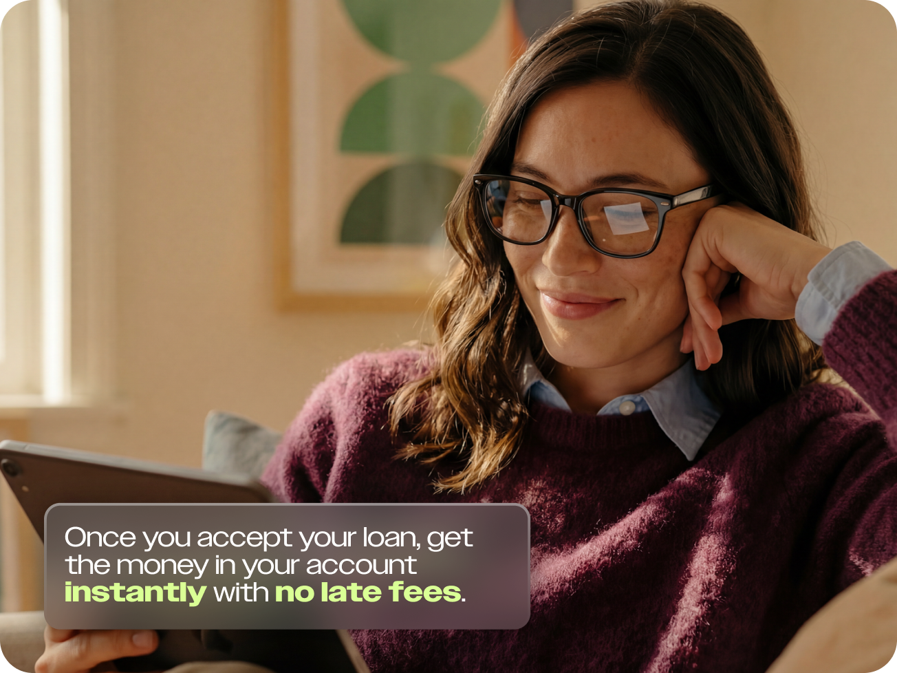 Woman with glasses smiling at a tablet, with text: accept your loan and get money instantly with no hidden fees.