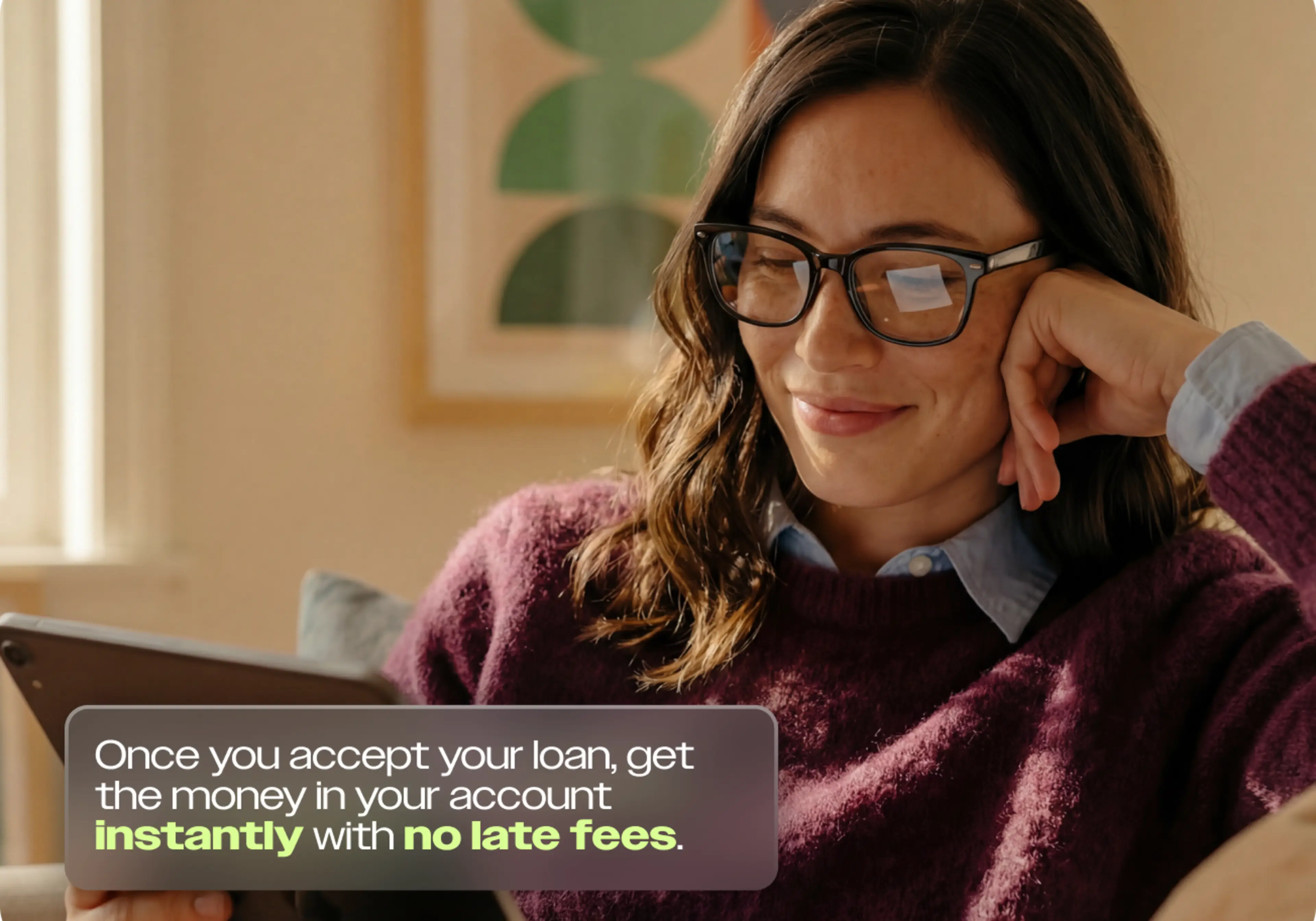 Woman with glasses smiling at a tablet, with text: accept your loan and get money instantly with no hidden fees.