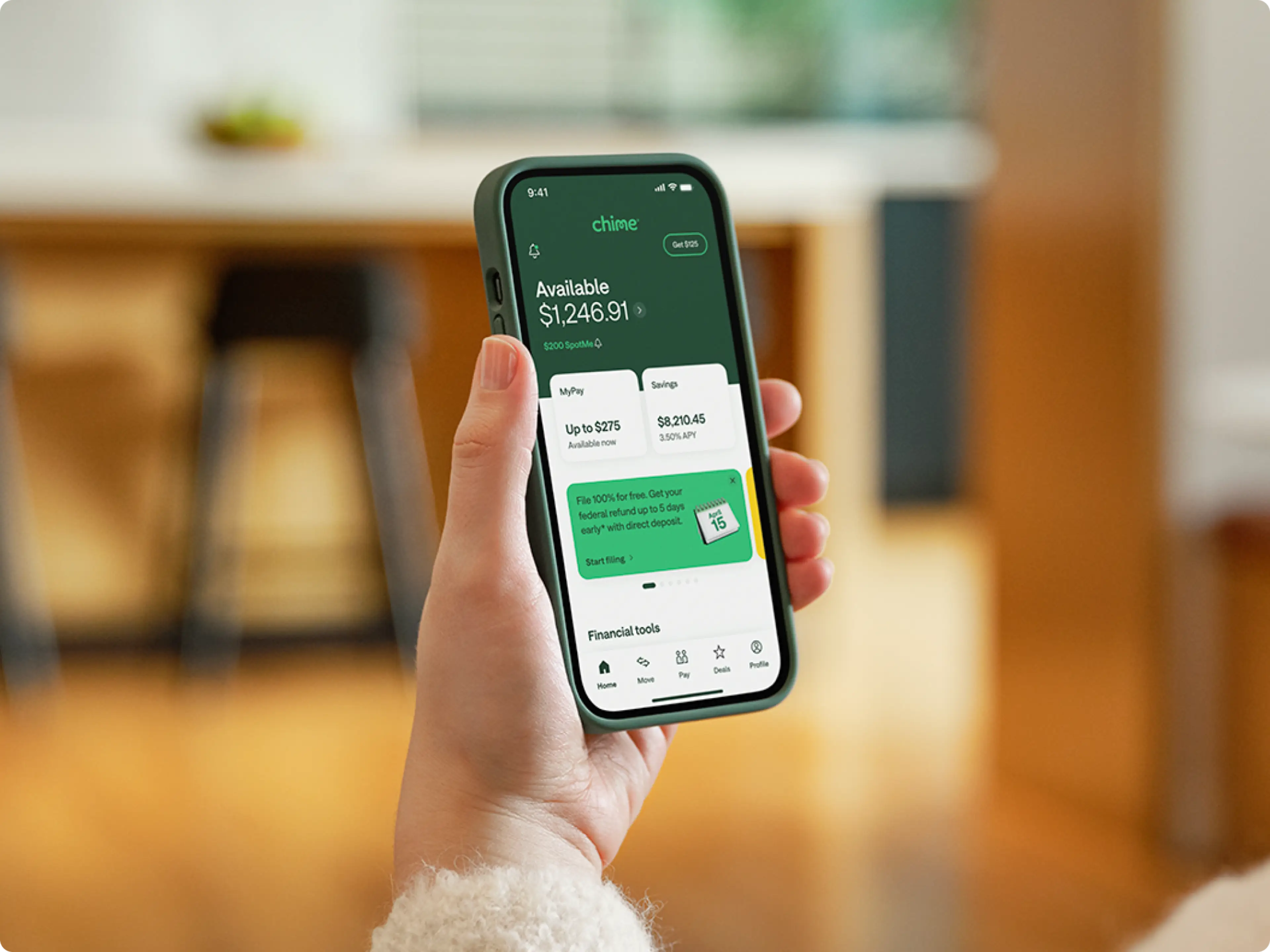A phone showing a Chime bank account balance.